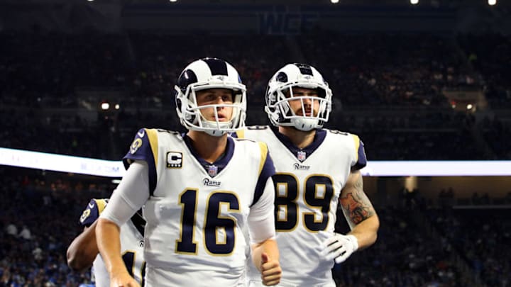 Los Angeles Rams quarterback Jared Goff (16) runs off the field flanked by Los Angeles Rams tight end Tyler Higbee (89) at the end of the first half of an NFL football game against the Los Angeles Rams in Detroit, Michigan USA, on Sunday, December 2, 2018. (Photo by Amy Lemus/NurPhoto via Getty Images)
