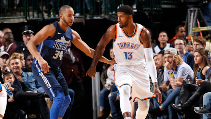 DALLAS, TX - NOVEMBER 25: Paul George #13 of the Oklahoma City Thunder handles the ball against the Dallas Mavericks on November 25, 2017 at the American Airlines Center in Dallas, Texas. NOTE TO USER: User expressly acknowledges and agrees that, by downloading and or using this photograph, User is consenting to the terms and conditions of the Getty Images License Agreement. Mandatory Copyright Notice: Copyright 2017 NBAE (Photo by Glenn James/NBAE via Getty Images)