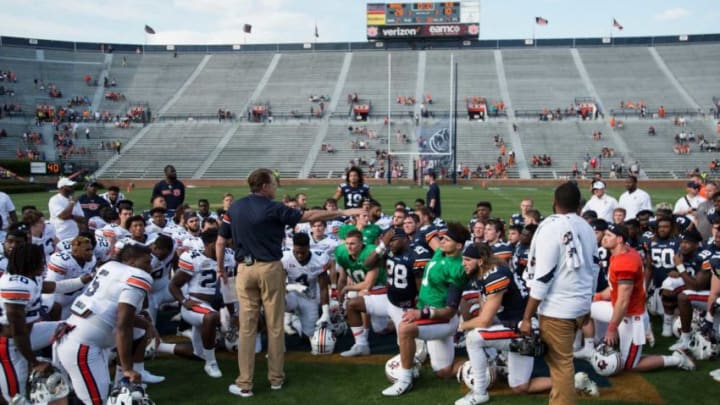 Auburn football head coach talks with his team after the game during the A-Day spring practice game at Jordan-Hare Stadium in Auburn, Ala., on Saturday, April 13, 2019.