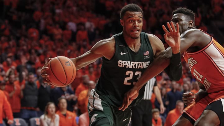 CHAMPAIGN, IL – FEBRUARY 11: Xavier Tillman #23 of the Michigan State Spartans drives to the basket against Kofi Cockburn #21 of the Illinois Fighting Illini during the second half at State Farm Center on February 11, 2020 in Champaign, Illinois. (Photo by Michael Hickey/Getty Images)