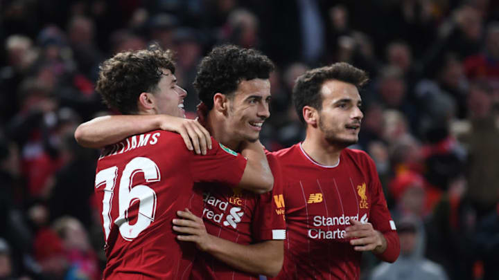 LIVERPOOL, ENGLAND - OCTOBER 30: Curtis Jones of Liverpool celebrates the fifth goal with Neco Williams during the Carabao Cup Round of 16 match between Liverpool and Arsenal at Anfield on October 30, 2019 in Liverpool, England. (Photo by Laurence Griffiths/Getty Images)
