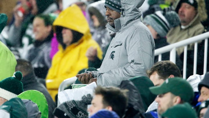 EAST LANSING, MI – NOVEMBER 24: Fans are bundled up against the rain and cold during the first half of the Michigan State Spartans game against the Rutgers Scarlet Knights at Spartan Stadium on November 24, 2018 in East Lansing, Michigan. (Photo by Duane Burleson/Getty Images)