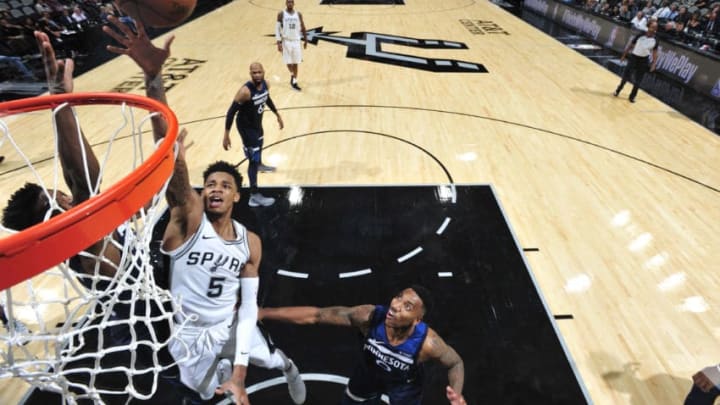 SAN ANTONIO, TX - OCTOBER 18: Dejounte Murray #5 of the San Antonio Spurs goes to the basket against the Minnesota Timberwolves on October 18, 2017 at the AT&T Center in San Antonio, Texas. NOTE TO USER: User expressly acknowledges and agrees that, by downloading and or using this photograph, user is consenting to the terms and conditions of the Getty Images License Agreement. Mandatory Copyright Notice: Copyright 2017 NBAE (Photos by Mark Sobhani/NBAE via Getty Images)