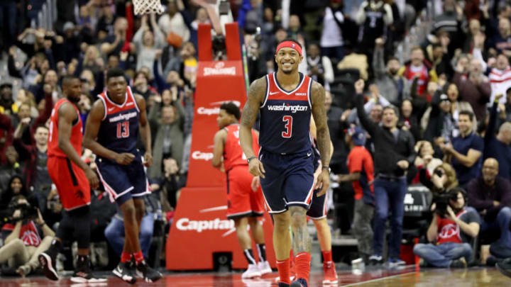 WASHINGTON, DC - JANUARY 13: Bradley Beal #3 of the Washington Wizards celebrates after hitting the game tying shot in regulation against the Toronto Raptors at Capital One Arena on January 13, 2019 in Washington, DC. NOTE TO USER: User expressly acknowledges and agrees that, by downloading and or using this photograph, User is consenting to the terms and conditions of the Getty Images License Agreement. (Photo by Rob Carr/Getty Images)