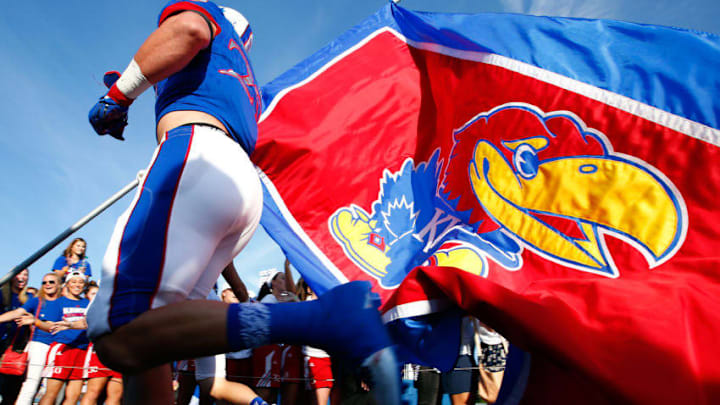 LAWRENCE, KS - SEPTEMBER 12: The Kansas Jayhawks run onto the field prior to the game against the Memphis Tigers at Memorial Stadium on September 12, 2015 in Lawrence, Kansas. (Photo by Jamie Squire/Getty Images)