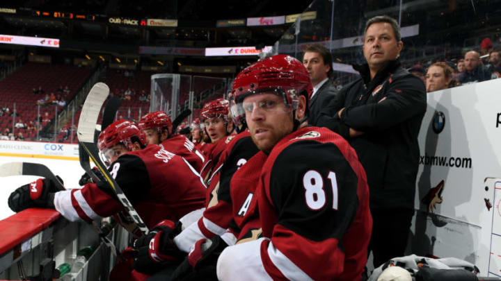 GLENDALE, ARIZONA - SEPTEMBER 17: (former Boston Bruins draft pick) Phil Kessel #81 of the Arizona Coyotes looks on from the bench during the third period of an NHL preseason game against the Los Angeles Kings at Gila River Arena on September 17, 2019 in Glendale, Arizona. (Photo by Norm Hall/NHLI via Getty Images)