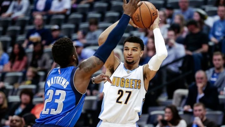 Oct 21, 2016; Denver, CO, USA; Dallas Mavericks guard Wesley Matthews (23) defends against Denver Nuggets guard Jamal Murray (27) in the first quarter at the Pepsi Center. Mandatory Credit: Isaiah J. Downing-USA TODAY Sports