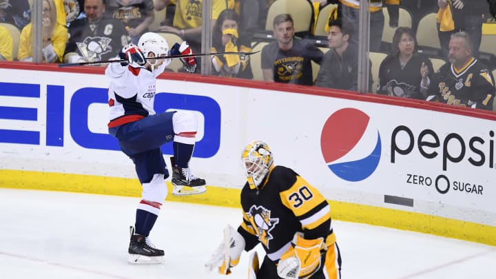 PITTSBURGH, PA – MAY 07: Washington Capitals Center Evgeny Kuznetsov (92) celebrates after scoring the game winning goal past Pittsburgh Penguins goaltender Matt Murray (30) during the overtime period. The Washington Capitals went on win 2-1 in the overtime period against the Pittsburgh Penguins in Game Six of the Eastern Conference Second Round during the 2018 NHL Stanley Cup Playoffs on May 7, 2018, at PPG Paints Arena in Pittsburgh, PA. The Capitals won the series 4-2 and advance to the Conference Finals. (Photo by Jeanine Leech/Icon Sportswire via Getty Images)