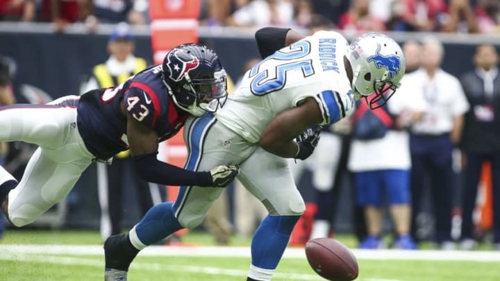 Oct 30, 2016; Houston, TX, USA; Detroit Lions running back Theo Riddick (25) is unable to make a reception as Houston Texans defensive back Corey Moore (43) defends during the second quarter at NRG Stadium. Mandatory Credit: Troy Taormina-USA TODAY Sports