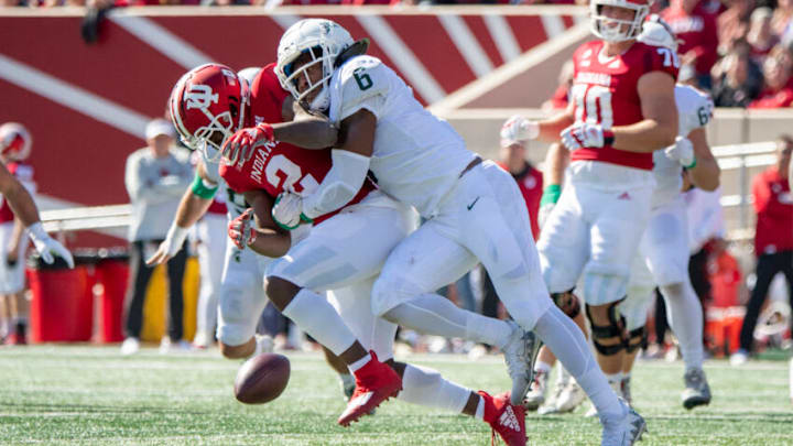 Oct 16, 2021; Bloomington, Indiana, USA; Indiana Hoosiers wide receiver Jacolby Hewitt (2) misses a pass under coverage from Michigan State Spartans linebacker Quavaris Crouch (6) during the first quarter at Memorial Stadium. Mandatory Credit: Marc Lebryk-USA TODAY Sports