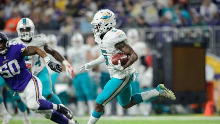 MINNEAPOLIS, MN - AUGUST 31: Torry McTyer #5 of the Miami Dolphins carries the ball against the Minnesota Vikings in the preseason game on August 31, 2017 at U.S. Bank Stadium in Minneapolis, Minnesota. The Dolphins defeated the Vikings 30-9. (Photo by Hannah Foslien/Getty Images)