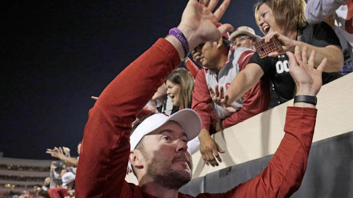 STILLWATER, OK – NOVEMBER 04: Head Coach Lincoln Riley of the Oklahoma Sooners celebrates with fans after the game against the Oklahoma State Cowboys at Boone Pickens Stadium on November 4, 2017 in Stillwater, Oklahoma. Oklahoma defeated Oklahoma State 62-52. (Photo by Brett Deering/Getty Images)