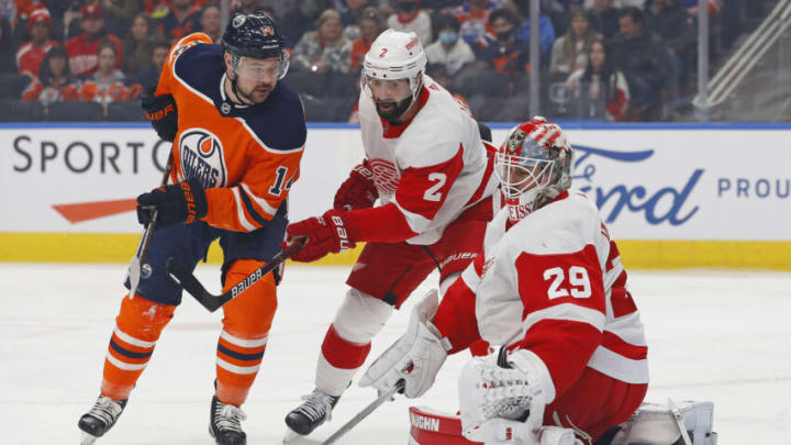 Mar 15, 2022; Edmonton, Alberta, CAN; Edmonton Oilers forward Devin Shore (14) scores a goal against Detroit Red Wings goaltender Thomas Greiss (29) during the first period at Rogers Place. Mandatory Credit: Perry Nelson-USA TODAY Sports