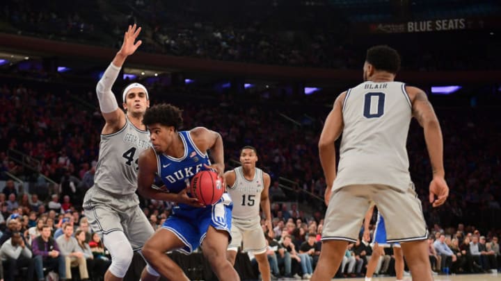 NEW YORK, NEW YORK - NOVEMBER 22: Vernon Carey Jr. #1 of the Duke Blue Devils drives past Omer Yurtseven #44 of the Georgetown Hoyas during the second half of their game at Madison Square Garden on November 22, 2019 in New York City. (Photo by Emilee Chinn/Getty Images)