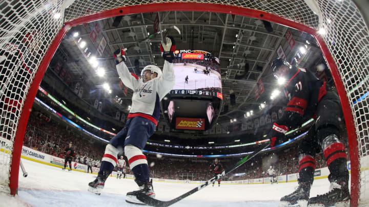 RALEIGH, NC – JANUARY 3: Evgeny Kuznetsov #92 of the Washington Capitals scores a goal and celebrates during an NHL game against the Carolina Hurricanes on January 3, 2020 at PNC Arena in Raleigh, North Carolina. (Photo by Gregg Forwerck/NHLI via Getty Images)