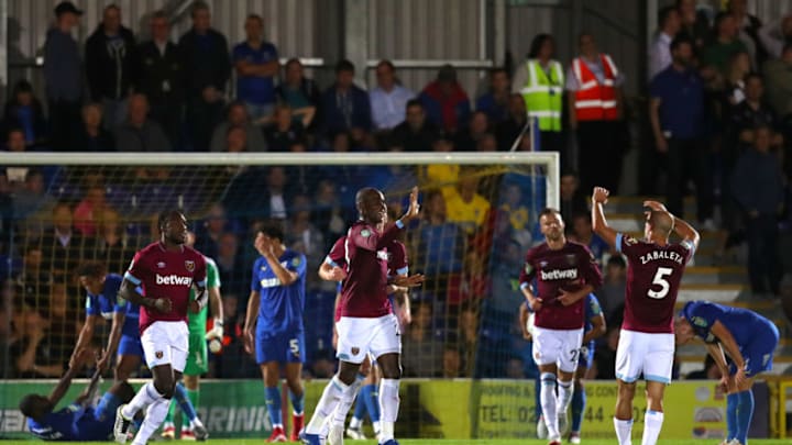 KINGSTON UPON THAMES, ENGLAND - AUGUST 28: Angelo Ogbonna of West Ham United celebrates after scoring his team's second goal with his team mates during the Carabao Cup Second Round match between AFC Wimbledon and West Ham United at The Cherry Red Records Stadium on August 28, 2018 in Kingston upon Thames, England. (Photo by Catherine Ivill/Getty Images)