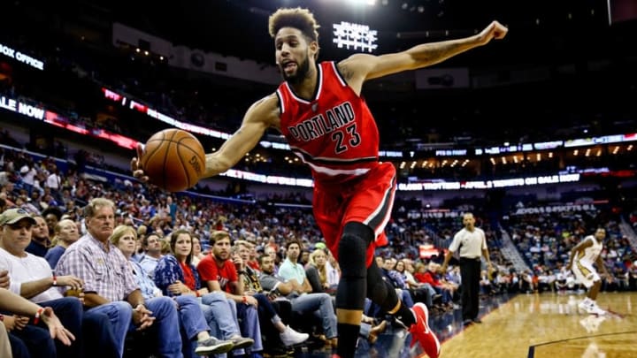 Mar 18, 2016; New Orleans, LA, USA; Portland Trail Blazers guard Allen Crabbe (23) leaps to save a ball from going out of bounds during the second quarter of a game against the New Orleans Pelicans at the Smoothie King Center. Mandatory Credit: Derick E. Hingle-USA TODAY Sports