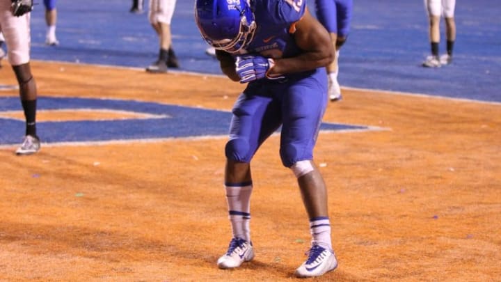 Nov 18, 2016; Boise, ID, USA; Boise State Broncos running back Jeremy McNichols (13) salutes the crowd after scoring a touchdown in first half action against the UNLV Rebels at Albertsons Stadium. Mandatory Credit: Brian Losness-USA TODAY Sports