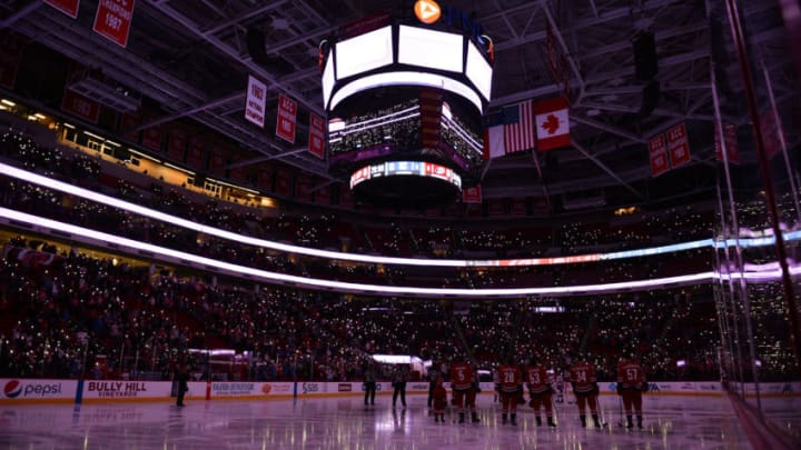 RALEIGH, NC - NOVEMBER 22: Carolina Hurricanes fans lights the arena in honor of Hockey Fights Cancer during a game between the Carolina Hurricanes and the New York Rangers at the PNC Arena in Raleigh, NC on November 22, 2017. (Photo by Greg Thompson/Icon Sportswire via Getty Images)
