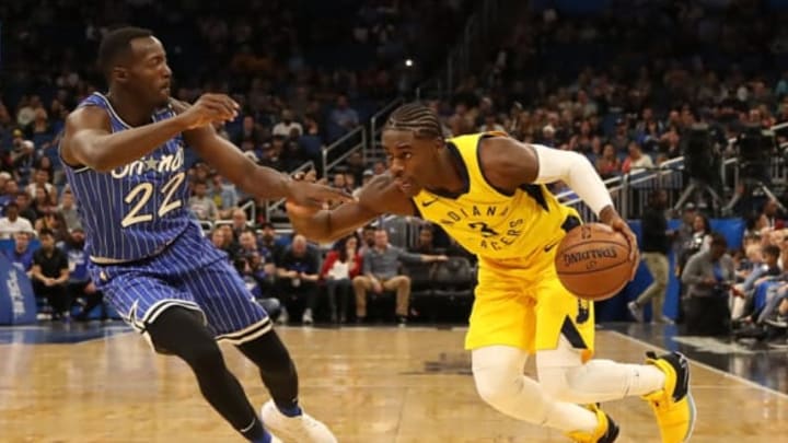 ORLANDO, FLORIDA – DECEMBER 07: Aaron Holiday #3 of the Indiana Pacers drives against Jerian Grant #22 of the Orlando Magic during the game at Amway Center on December 07, 2018 in Orlando, Florida. (Photo by Sam Greenwood/Getty Images)