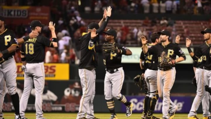 Aug 13, 2015; St. Louis, MO, USA; Pittsburgh Pirates teammates celebrate after defeating the St. Louis Cardinals 10-5 at Busch Stadium. Mandatory Credit: Jasen Vinlove-USA TODAY Sports
