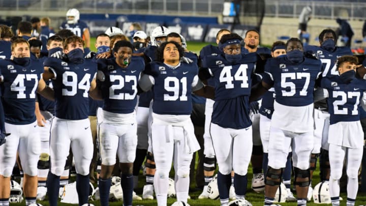 Nov 21, 2020; University Park, Pennsylvania, USA; Penn State Nittany Lions players react during the playing of the alma mater following the game against the Iowa Hawkeyes at Beaver Stadium. Mandatory Credit: Rich Barnes-USA TODAY Sports