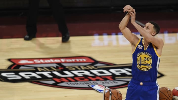 Feb 13, 2016; Toronto, Ontario, Canada; Golden State Warriors guard Stephen Curry (30) watches the ball during the three-point contest during the All-Stars Saturday Night at Air Canada Centre. Mandatory Credit: Peter Llewellyn-USA TODAY Sports