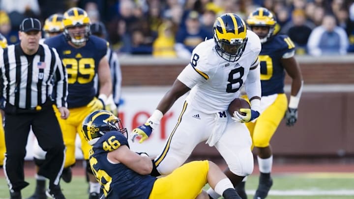 Apr 1, 2016; Ann Arbor, MI, USA; Michigan Wolverines tight end Tyrone Wheatley (8) rushes during the spring game at Michigan Stadium. Mandatory Credit: Rick Osentoski-USA TODAY Sports