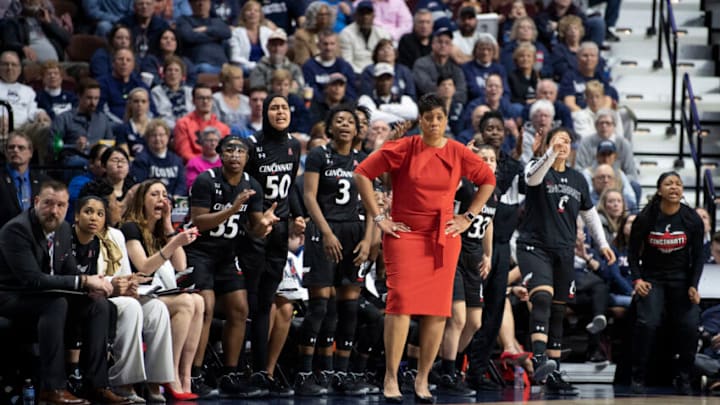 Cincinnati Bearcats head coach Michelle Clark-Heard leads team against UConn Huskies. Getty Images.