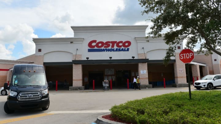 PEMBROKE PINES, FLORIDA - JULY 16: Customers wearing face masks leaving a Costco Wholesale store on July 16, 2020 in Pembroke Pines, Florida. Some major U.S. corporations are requiring masks to be worn in their stores upon entering to control the spread of COVID-19. (Photo by Johnny Louis/Getty Images)