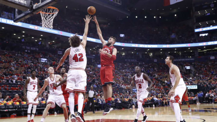 TORONTO, CANADA - OCTOBER 19: Jonas Valanciunas #17 of the Toronto Raptors shoots the ball against the Chicago Bulls during the game on October 19, 2017 at the Air Canada Centre in Toronto, Ontario, Canada. NOTE TO USER: User expressly acknowledges and agrees that, by downloading and or using this Photograph, user is consenting to the terms and conditions of the Getty Images License Agreement. Mandatory Copyright Notice: Copyright 2017 NBAE (Photo by Mark Blinch/NBAE via Getty Images)