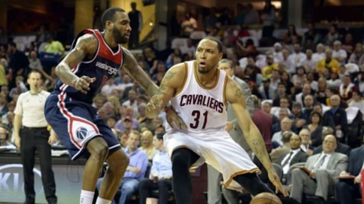 Apr 15, 2015; Cleveland, OH, USA; Cleveland Cavaliers guard Shawn Marion (31) dribbles against Washington Wizards forward Rasual Butler (8) in the third quarter at Quicken Loans Arena. Mandatory Credit: David Richard-USA TODAY Sports Apr 15, 2015; Cleveland, OH, USA; Cleveland Cavaliers guard Shawn Marion (31) dribbles against Washington Wizards forward Rasual Butler (8) in the third quarter at Quicken Loans Arena. Mandatory Credit: David Richard-USA TODAY Sports