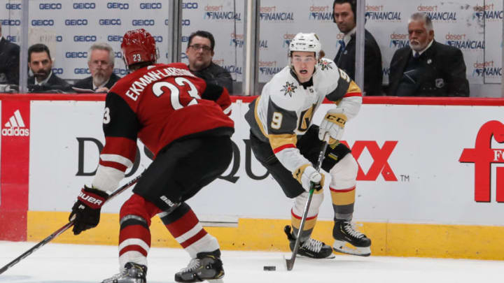 GLENDALE, AZ - OCTOBER 10: Vegas Golden Knights center Cody Glass (9) skates with the puck defended by Arizona Coyotes defenseman Oliver Ekman-Larsson (23) during the NHL hockey game between the Vegas Golden Knights and the Arizona Coyotes on October 10, 2019 at Gila River Arena in Glendale, Arizona. (Photo by Kevin Abele/Icon Sportswire via Getty Images)