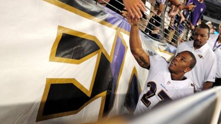 Aug 7, 2014; Baltimore, MD, USA; Baltimore Ravens running back Ray Rice (27) high fives fans after beating the San Francisco 49ers 23-3 at M&T Bank Stadium. Mandatory Credit: Evan Habeeb-USA TODAY Sports