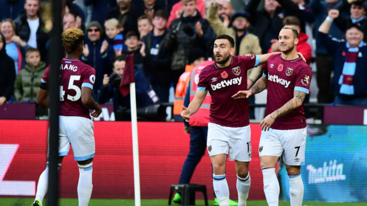 LONDON, ENGLAND - NOVEMBER 03: Marko Arnautovic of West Ham United celebrates after scoring his team's first goal with Robert Snodgrass of West Ham United and Grady Diangana of West Ham United during the Premier League match between West Ham United and Burnley FC at London Stadium on November 3, 2018 in London, United Kingdom. (Photo by Alex Broadway/Getty Images)