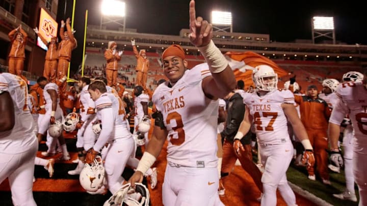 STILLWATER, OK - NOVEMBER 15: Linebacker Jordan Hicks #3 of the Texas Longhorns celebrates after the game against the Oklahoma State Cowboys November 15, 2014 at Boone Pickens Stadium in Stillwater, Oklahoma. The Longhorns defeated the Cowboys 28-7. (Photo by Brett Deering/Getty Images)