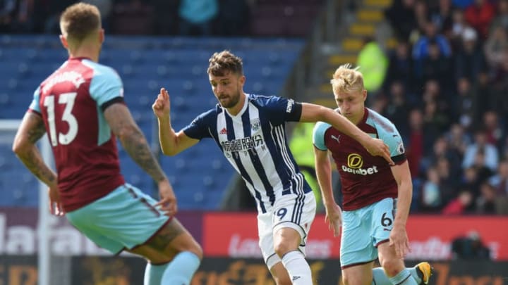 BURNLEY, ENGLAND – AUGUST 19: Jay Rodriguez of West Bromwich Albion attempts to take the ball away from Ben Mee of Burnley during the Premier League match between Burnley and West Bromwich Albion at Turf Moor on August 19, 2017 in Burnley, England. (Photo by Tony Marshall/Getty Images)