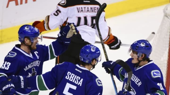 Dec 1, 2016; Vancouver, British Columbia, CAN; Vancouver Canucks forward Henrik Sedin (33) celebrates his goal against Anaheim Ducks goaltender John Gibson (36) during the third period at Rogers Arena. The Anaheim Ducks won 3-1. Mandatory Credit: Anne-Marie Sorvin-USA TODAY Sports