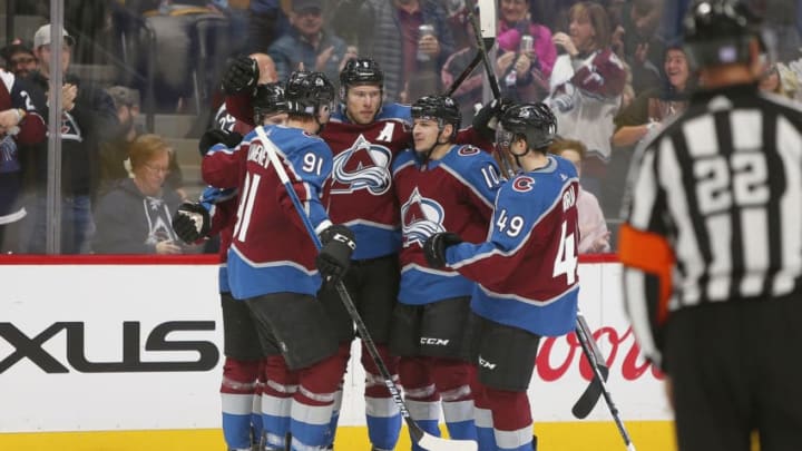 DENVER, CO - NOVEMBER 28: Team members celebrate a second period goal by Colorado Avalanche defenseman Erik Johnson (6) during a regular season game between the Colorado Avalanche and the visiting Pittsburgh Penguins on November 28, 2018 at the Pepsi Center in Denver, CO. (Photo by Russell Lansford/Icon Sportswire via Getty Images)
