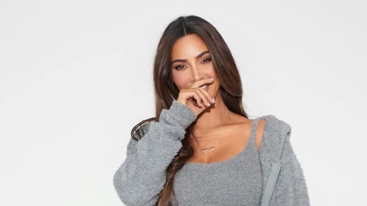 Discover Kim Kardashian's SKIMS cozy knit zip up hoodie at SKIMS.