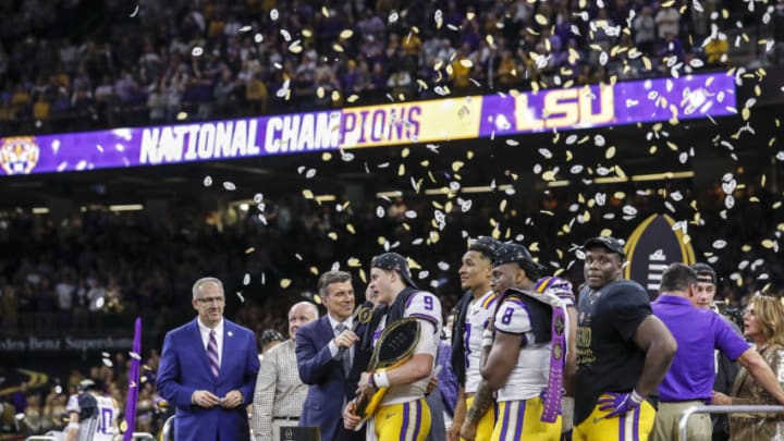 NEW ORLEANS, LA - JANUARY 13: ESPN's Rece Davis interviews Quarterback Joe Burrow #9 of the LSU Tigers on stage after the College Football Playoff National Championship game against the Clemson Tigers at the Mercedes-Benz Superdome on January 13, 2020 in New Orleans, Louisiana. LSU defeated Clemson 42 to 25. (Photo by Don Juan Moore/Getty Images)