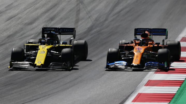 SPIELBERG, AUSTRIA – JUNE 30: Daniel Ricciardo of Australia driving the (3) Renault Sport Formula One Team RS19 and Carlos Sainz of Spain driving the (55) McLaren F1 Team MCL34 Renault (Photo by Charles Coates/Getty Images)