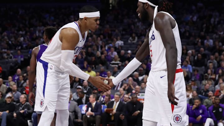 SACRAMENTO, CA - NOVEMBER 29: Montrezl Harrell #5 of the LA Clippers is congratulated by Tobias Harris #34 after making a basket against the Sacramento Kings at Golden 1 Center on November 29, 2018 in Sacramento, California. NOTE TO USER: User expressly acknowledges and agrees that, by downloading and or using this photograph, User is consenting to the terms and conditions of the Getty Images License Agreement. (Photo by Ezra Shaw/Getty Images)