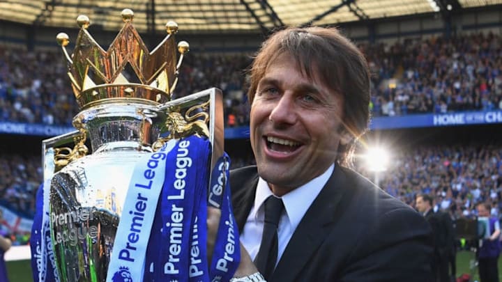LONDON, ENGLAND - MAY 21: Antonio Conte, Manager of Chelsea poses with the Premier League Trophy after the Premier League match between Chelsea and Sunderland at Stamford Bridge on May 21, 2017 in London, England. (Photo by Michael Regan/Getty Images)
