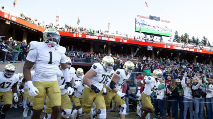 Nov 25, 2023; Stanford, California, USA; Notre Dame Fighting Irish players take the field against the Stanford Cardinal at Stanford Stadium. Mandatory Credit: D. Ross Cameron-USA TODAY Sports