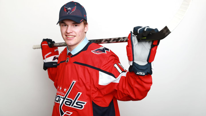 DALLAS, TX – JUNE 22: Alexander Alexeyev poses after being selected thirty-first overall by the Washington Capitals during the first round of the 2018 NHL Draft at American Airlines Center on June 22, 2018 in Dallas, Texas. (Photo by Tom Pennington/Getty Images)
