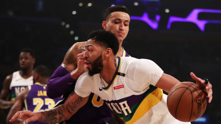 LOS ANGELES, CALIFORNIA - FEBRUARY 27: Anthony Davis #23 of the New Orleans Pelicans drives against Kyle Kuzma #0 of the Los Angeles Lakers during the first half at Staples Center on February 27, 2019 in Los Angeles, California. NOTE TO USER: User expressly acknowledges and agrees that, by downloading and or using this photograph, User is consenting to the terms and conditions of the Getty Images License Agreement. (Photo by Yong Teck Lim/Getty Images)