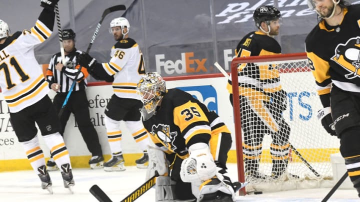 Apr 27, 2021; Pittsburgh, Pennsylvania, USA; Boston Bruins center David Krejci (46) celebrates a goal with Taylor Hall (71) as the puck made it past Pittsburgh Penguins goalie Tristan Jarry (35) during the second period at PPG Paints Arena. Mandatory Credit: Philip G. Pavely-USA TODAY Sports