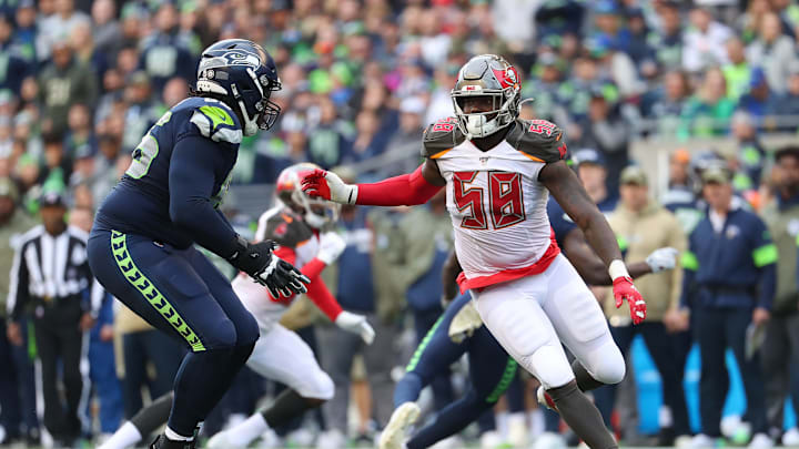 SEATTLE, WASHINGTON – NOVEMBER 03: Shaquil Barrett #58 of the Tampa Bay Buccaneers works against Germain Ifedi #65 of the Seattle Seahawks in the third quarter during their game at CenturyLink Field on November 03, 2019 in Seattle, Washington. (Photo by Abbie Parr/Getty Images)