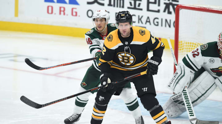 BOSTON, MA - JANUARY 8: David Backes #42 of the Boston Bruins against Jared Spurgeon #46 of the Minnesota Wild at the TD Garden on January 8, 2019 in Boston, Massachusetts. (Photo by Steve Babineau/NHLI via Getty Images)